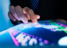 Market Analyze with Digital Moniter focus on tip of finger