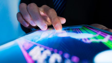 Market Analyze with Digital Moniter focus on tip of finger